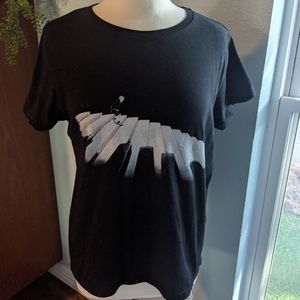 Designed by Humans piano graphic top